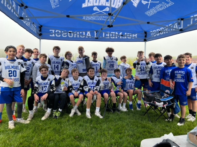 Boys Lacrosse at the Pingry Tournament.  Still smiling through the rain!