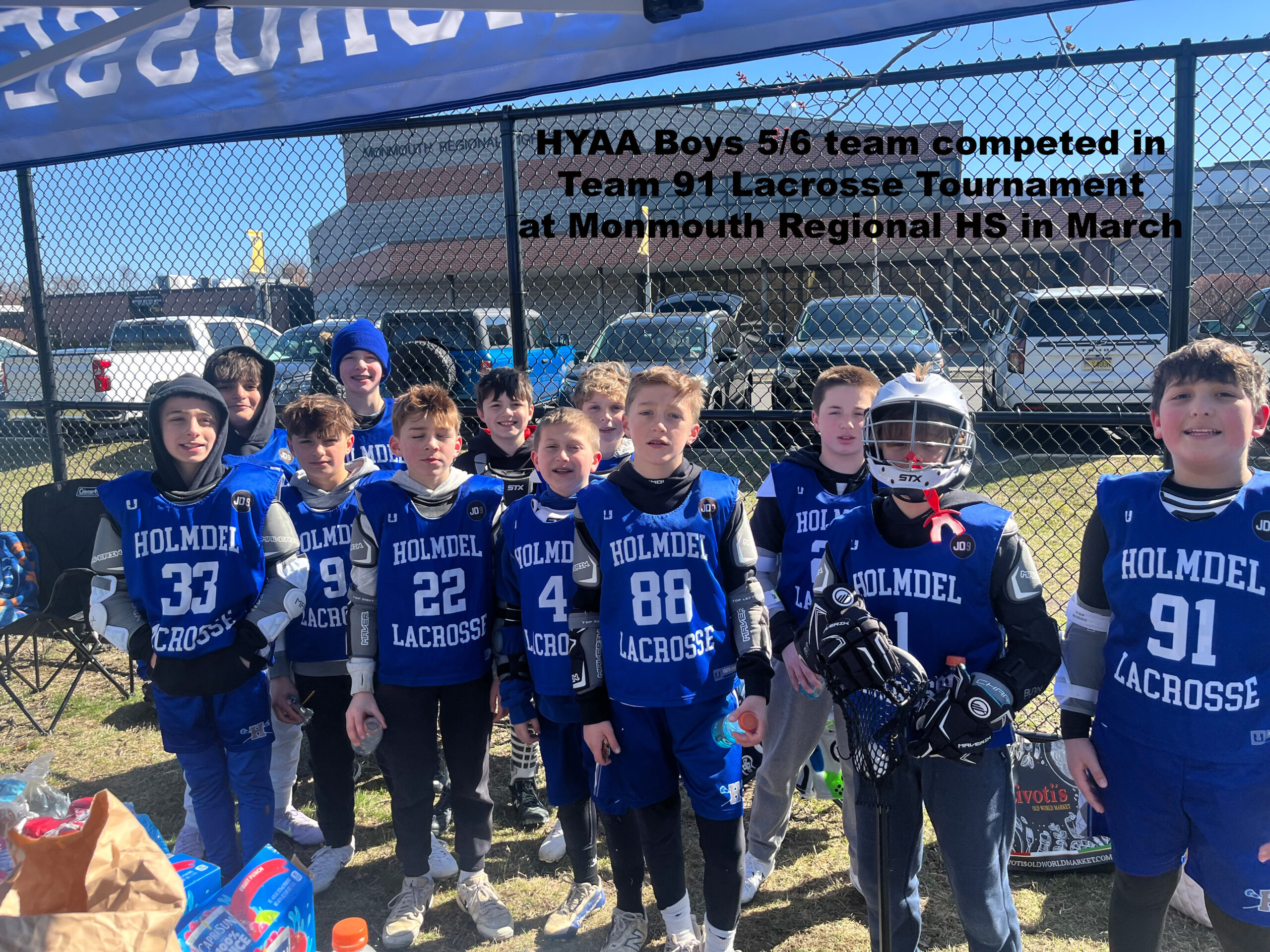 Boys 56 Lax captioned photo